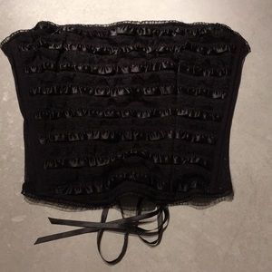 Black strapless Victoria’s Secret bustier.